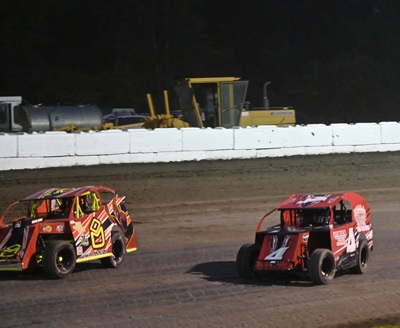 Harley Brown (8) battles Tristan Dibble (4) in the Modified Lites A Main